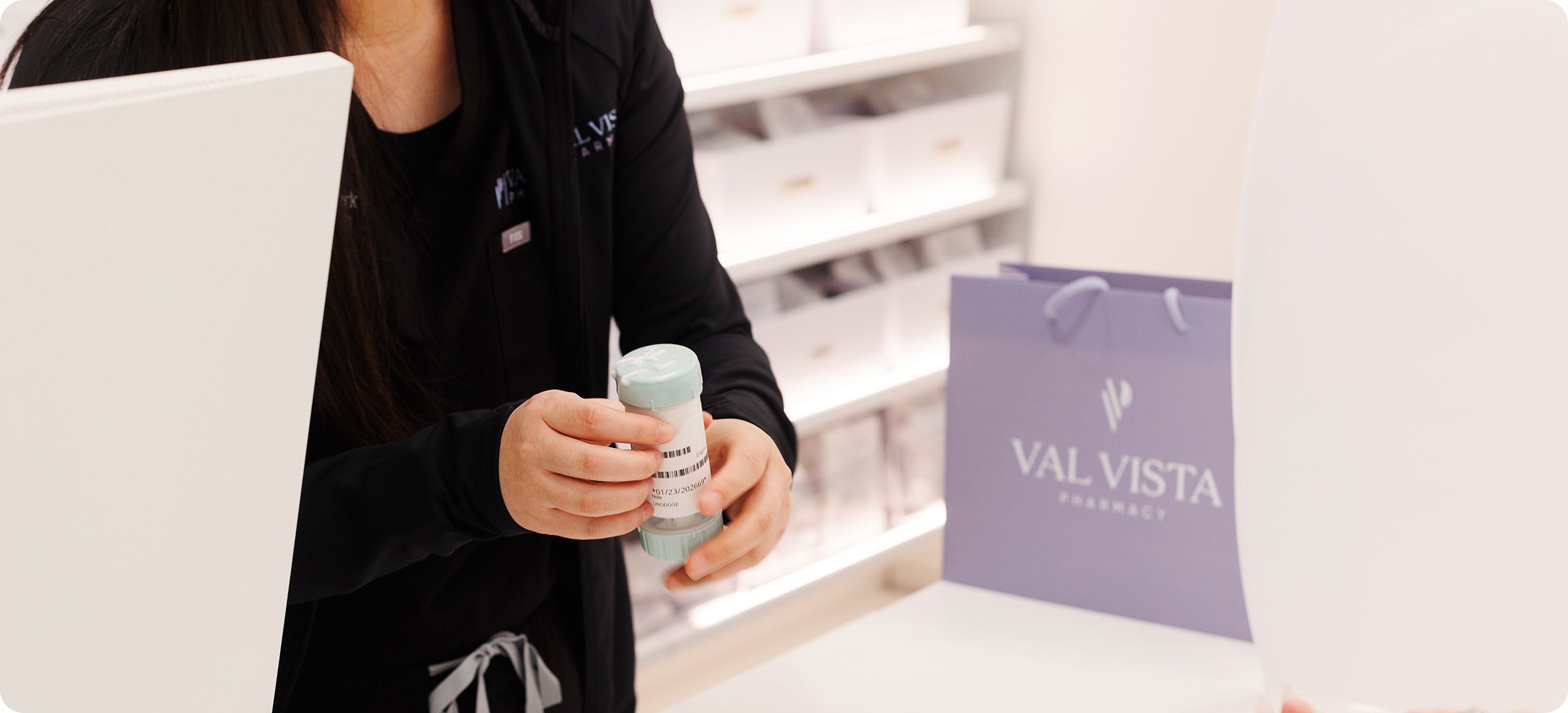 Close-up of compounded cream being applied and spread across skin at the application site