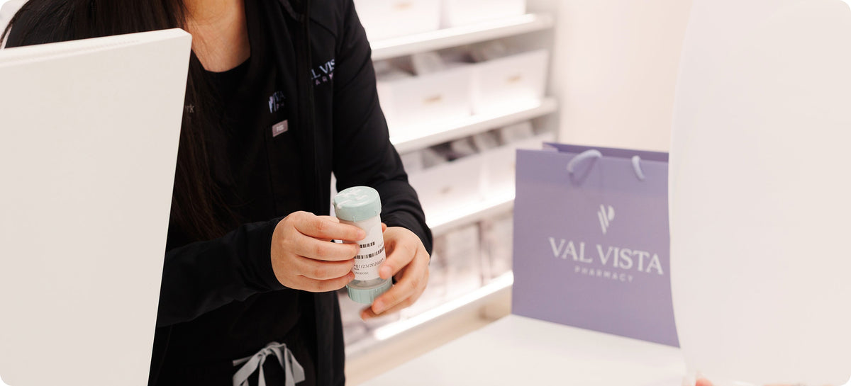 Close-up of compounded cream being applied and spread across skin at the application site